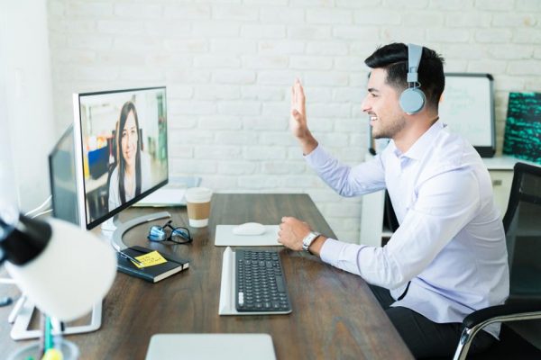 Professionals Greeting Through Conference Call