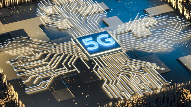 A semiconductor chip with 5G emblazoned on the center amid other circuitry.